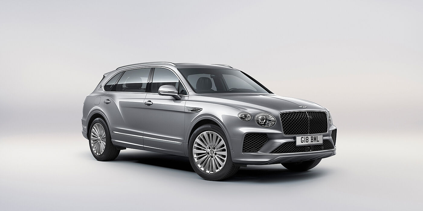 Bentley Budapest Bentley Bentayga Extended Wheelbase luxury SUV front three quarter view in Moonbeam paint with 21 inch five spoke painted wheels