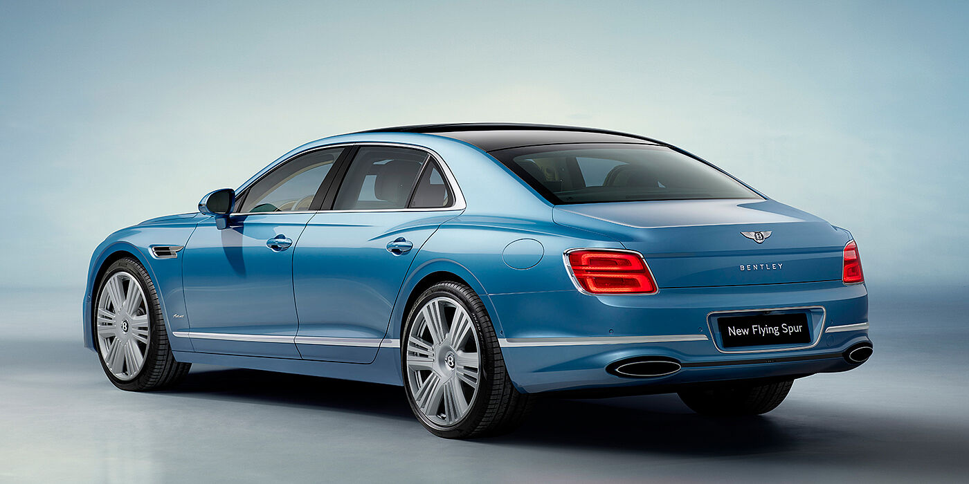 Bentley Budapest New Bentley Flying Spur Azure sedan rear view in Light windsor blue by Mulliner paint with 22 inch Azure wheels and chrome exterior details