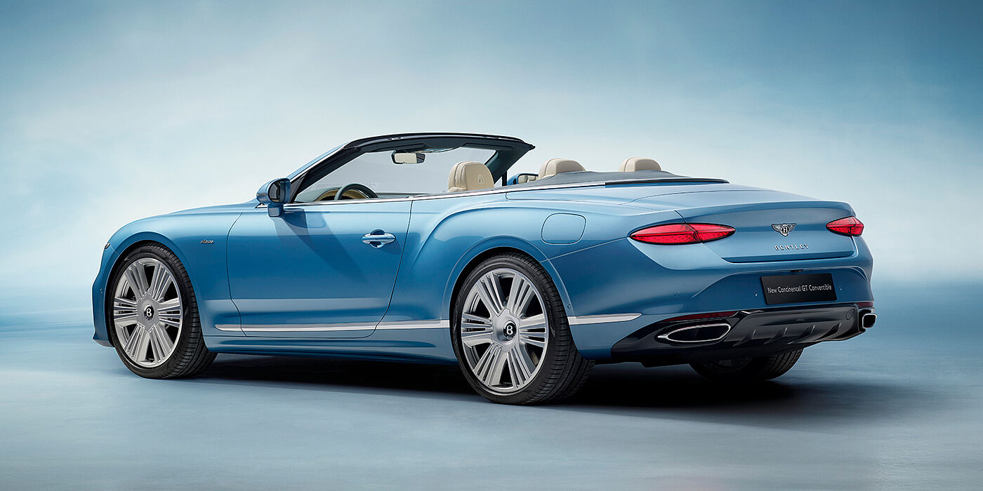 Bentley Budapest New Bentley Continental GTC Azure convertible rear view in Light Windsor blue paint with 22 inch ten spoke wheels and chrome exterior details