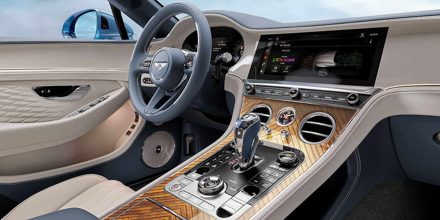 Bentley Budapest New Bentley Continental GTC Azure convertible interior front cabin view with Linen and Brunel hides and Piano Linen by Mulliner veneer featuring centre console and centre MMI screen