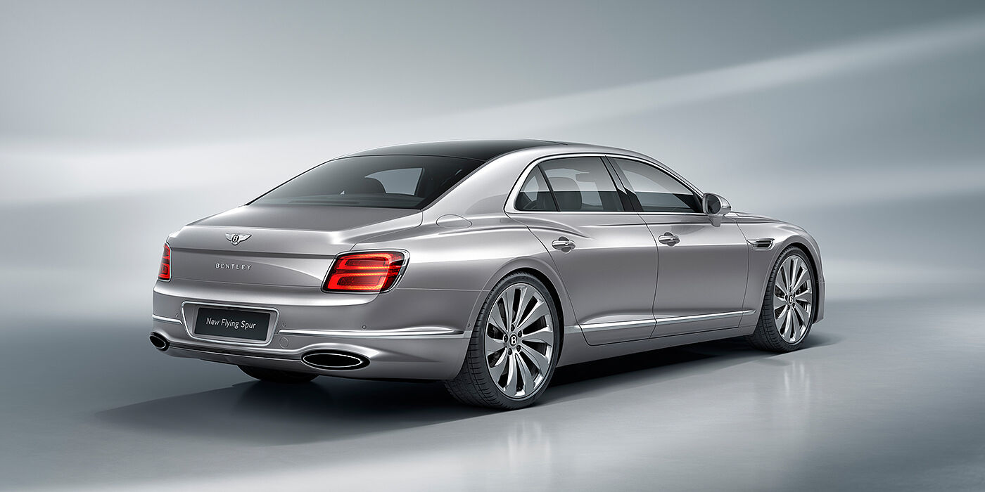 Bentley Budapest New Bentley Flying Spur sedan rear view in Silverlake paint with ten spoke wheels and chrome matrix grille